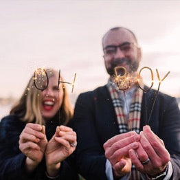 Happy Couple with Sparklers that say "Oh Boy"