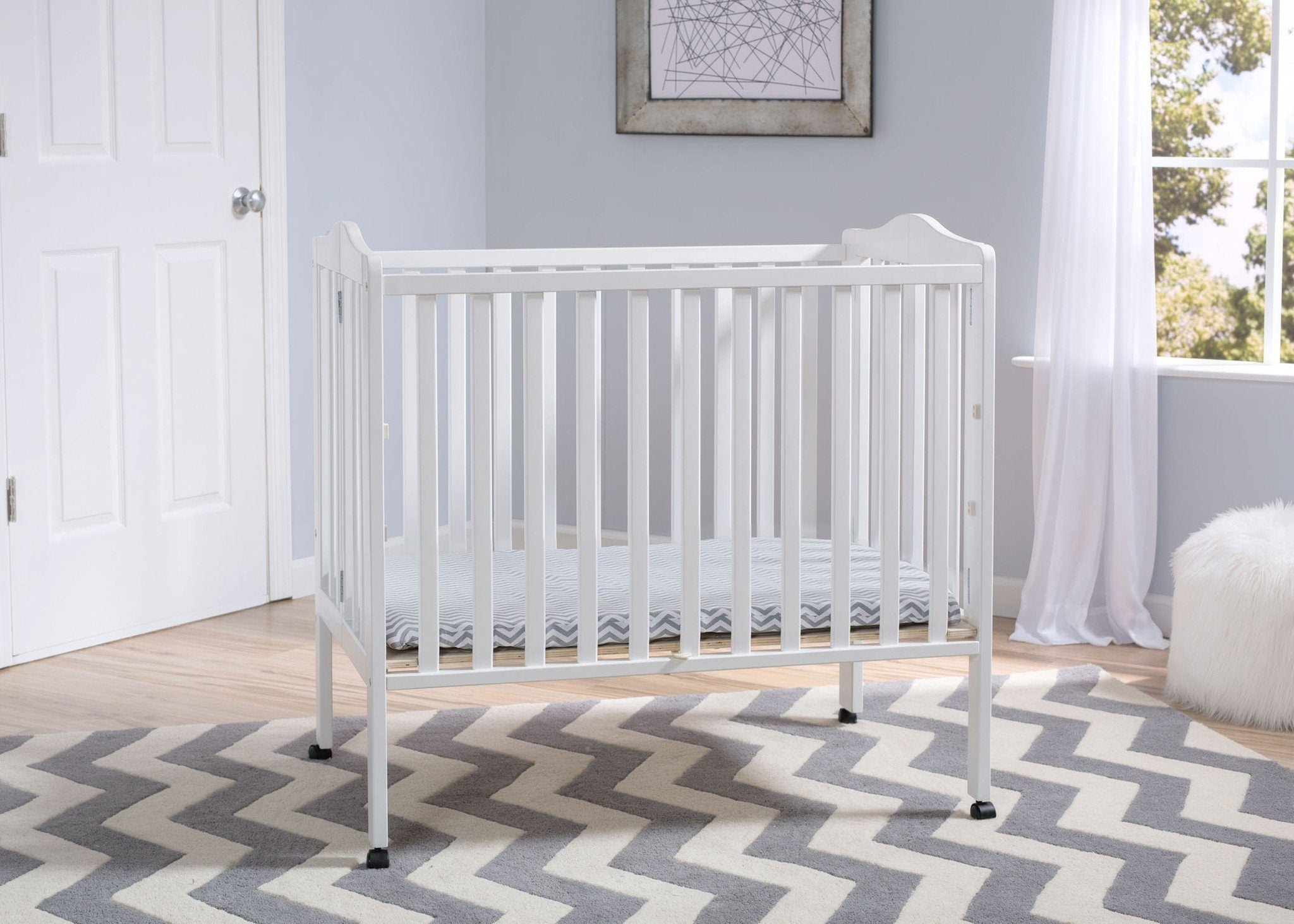 delta children folding portable crib with mattress