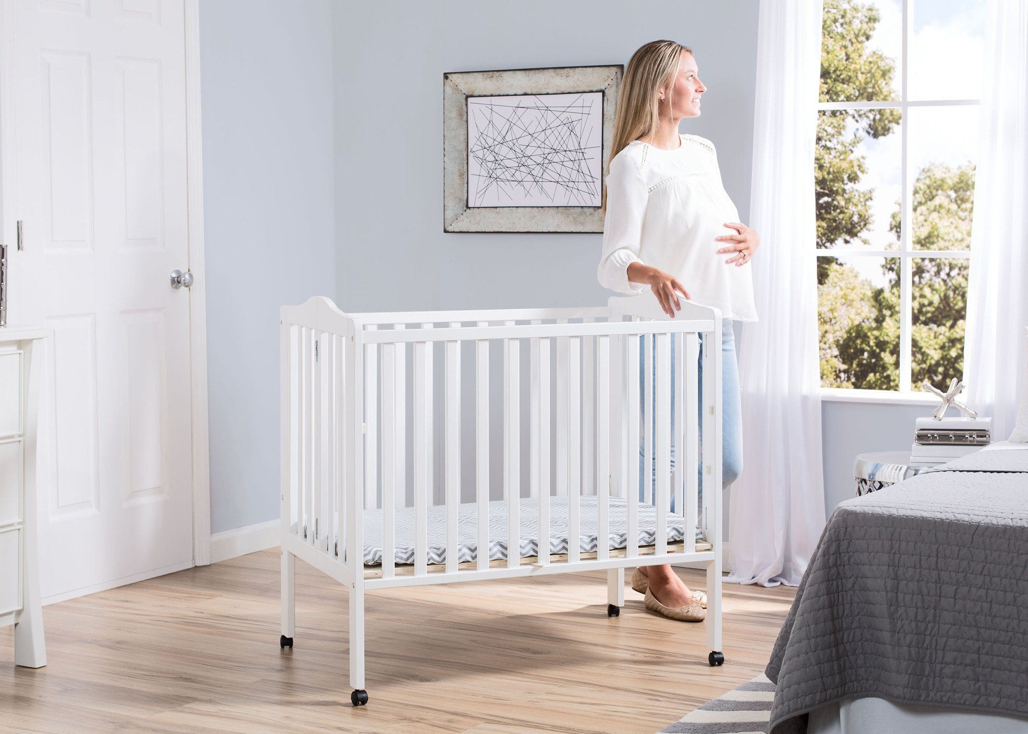 portable crib mattress vs crib mattress