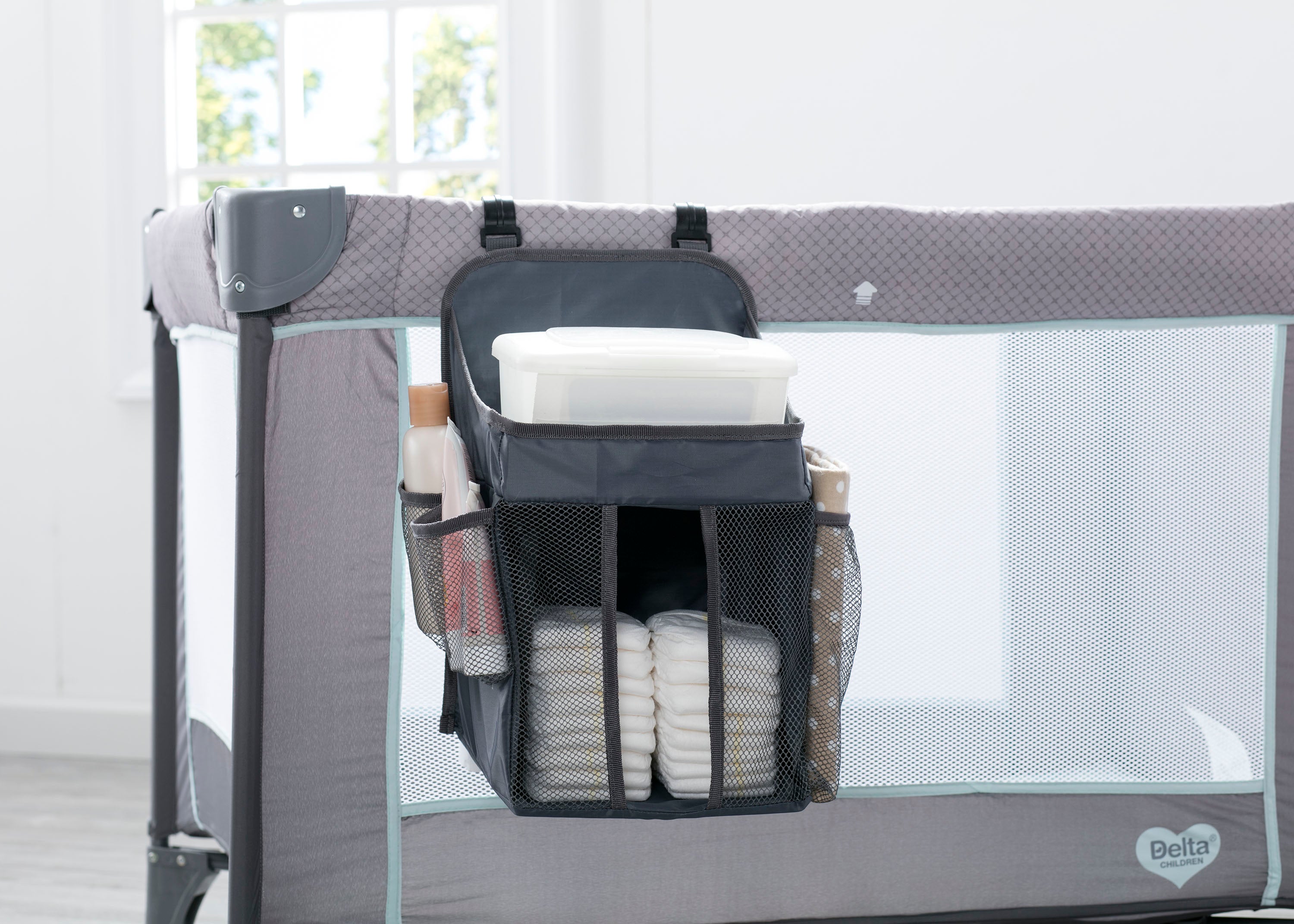 pack and play diaper storage