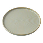 Yanco Round Plate With Upright Rim GO-109 is a stylish and functional piece from the Golden Coast collection. Crafted from high-quality chinaware, this bread and butter plate features elegant earthy tones and concentric circles, beautifully enhanced by a golden rim for a refined touch. Its round shape with an upright rim provides both aesthetic appeal and practicality, making it perfect for serving bread, appetizers, or desserts in upscale dining settings. 