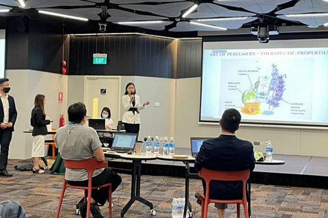 Joyce Lian, founder of Scent Journer, presenting her business pitch to industry mentors as part of the NUS and ESG venture building programme.