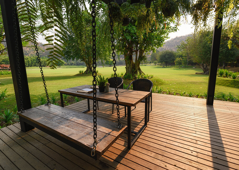 wooden-garden-table-and-benches-in-the-summer-time