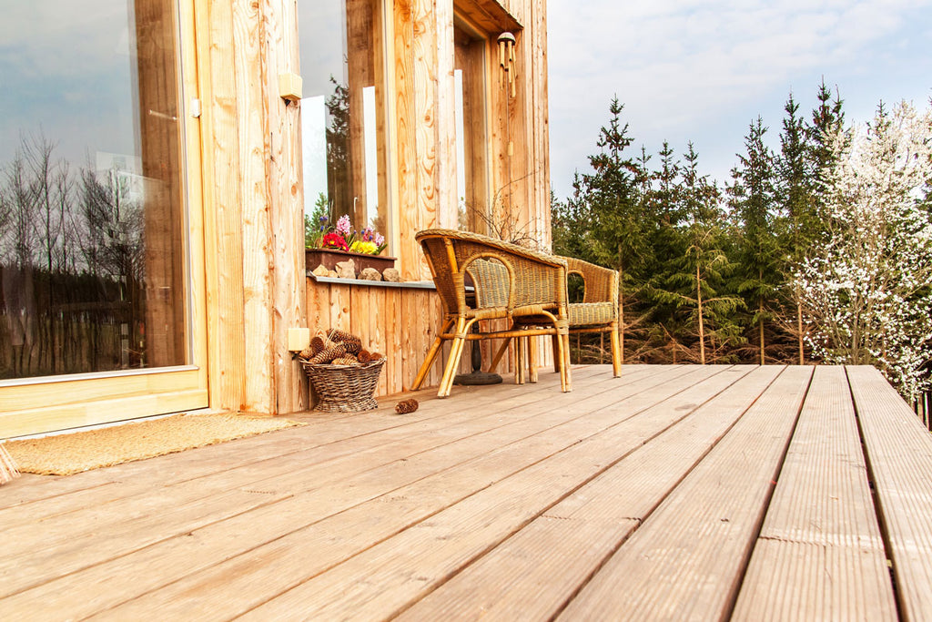 A-wooden-house-and-terrace-by-the-forest