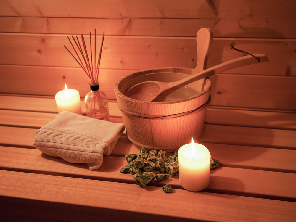 clean-sauna-with-candles-and-bucket