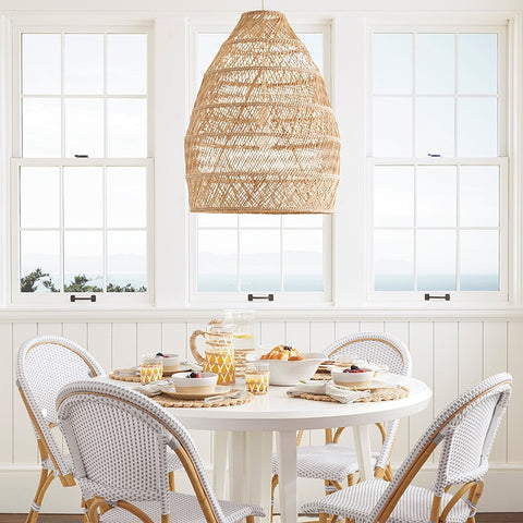 Modern Chinese Wicker Ceiling Light hanging above white table