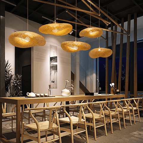Asian Bamboo Pendant Lights hanging above restaurant table