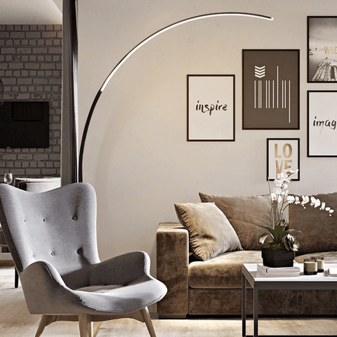 Nordic Arc Floor Lamp next to sofa in living room