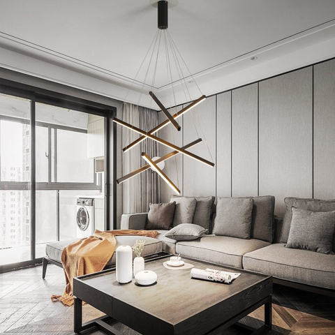 Staggered Strip Chandelier above coffee table in living room