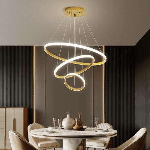 LED Ring Chandelier hanging above dining table