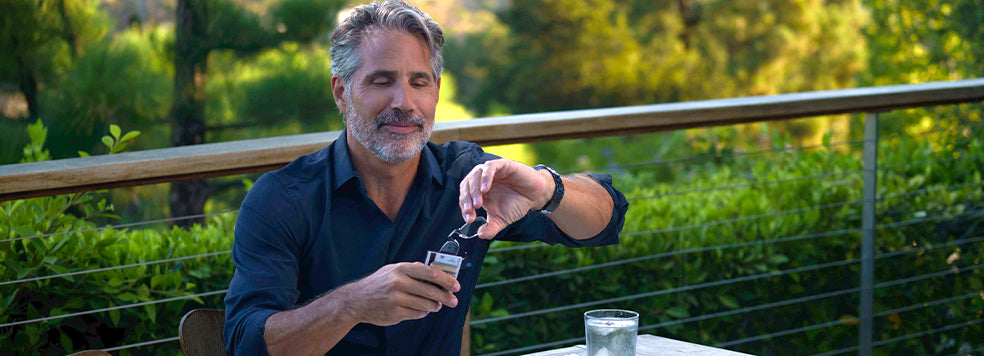 Man removing Readers from the Flashcard Wallet while at a restaurant