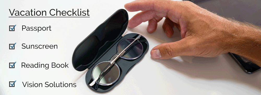 Hand reaching for Manhattan Reading Glasses in the Milano Case next to a vacation checklist