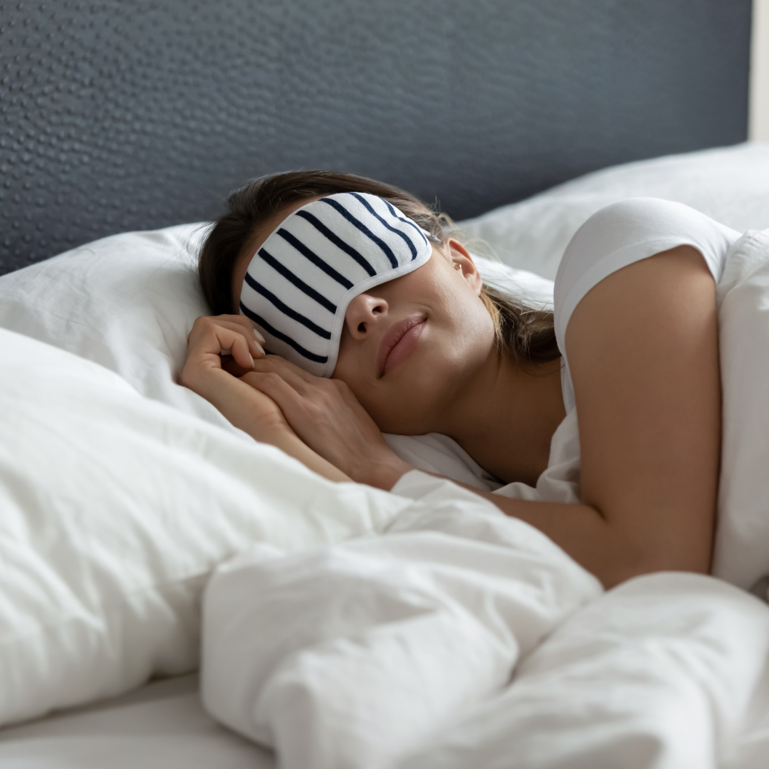 woman sleeping comfortably in bed