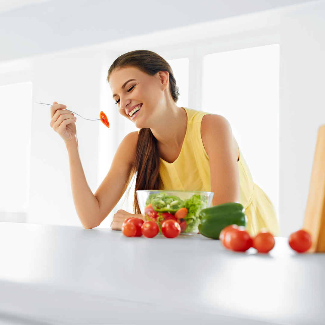 happy woman eating healthy food