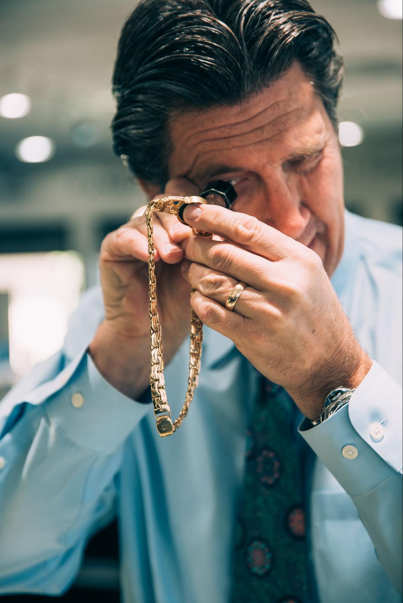 Jewelry Professional Inspecting a Piece