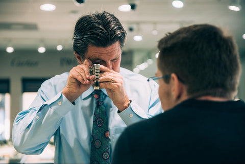 Rolex buyer evaluating Rolex watch