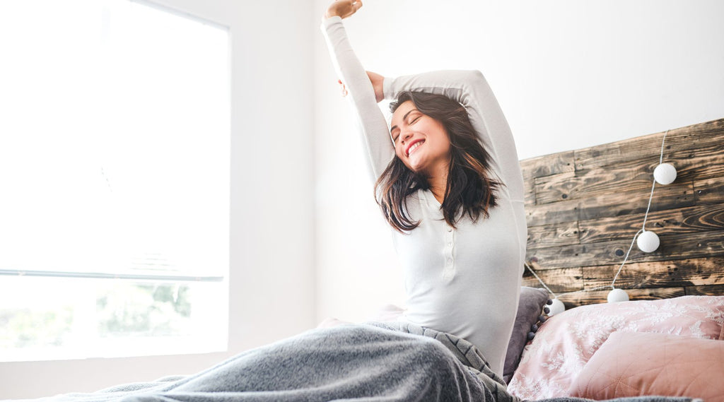 Woman waking up feeling revitalised