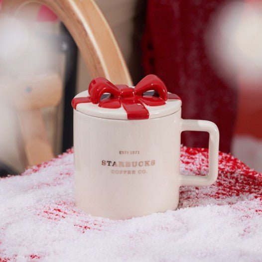 https://cdn.shopify.com/s/files/1/0579/1331/1387/products/starbucks-china-2022-xmas-2nd-online-gift-mug-410ml-438161_1024x.jpg?v=1674153234