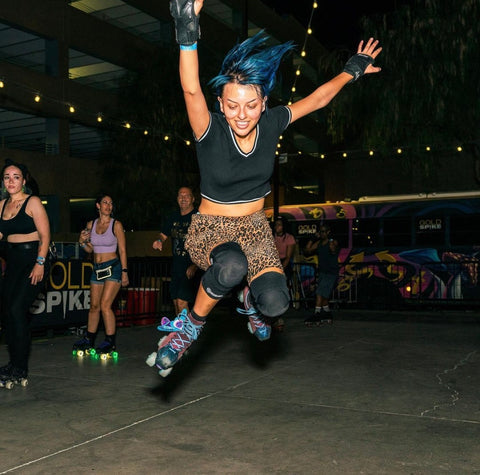 Jackie jumping on skates