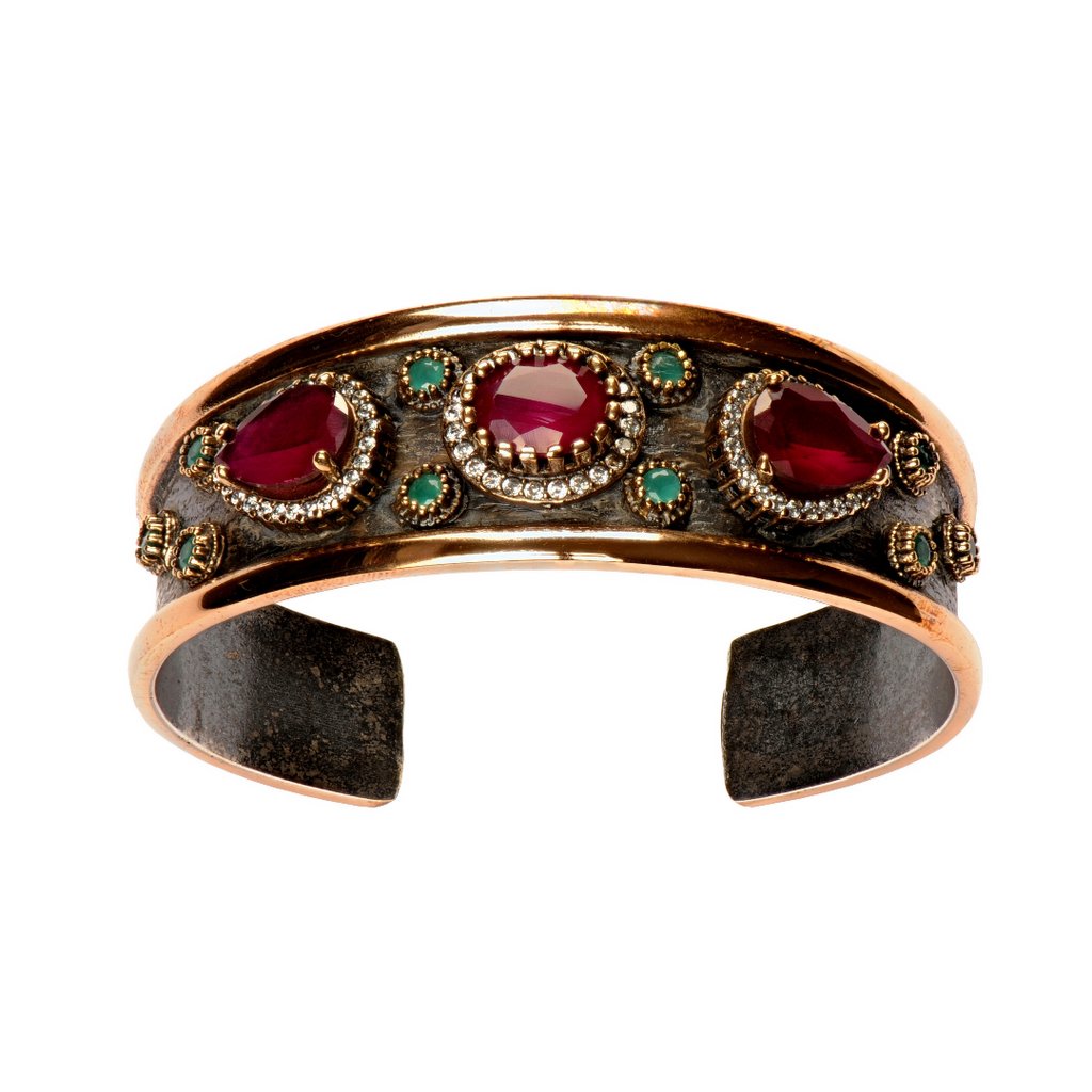 An antique bracelet with rare gemstones.