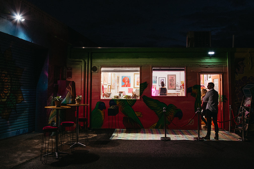 Looking into Alykat Gallery from the Coffs night light laneway.