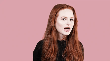 redhaired woman winking gif