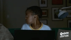 quinta brunson looking on laptop in the dark gif