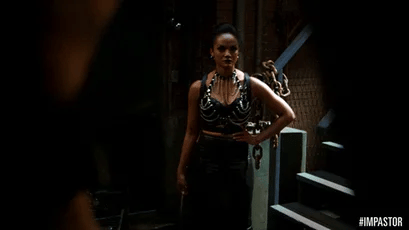 black woman cracking whip in leather gif