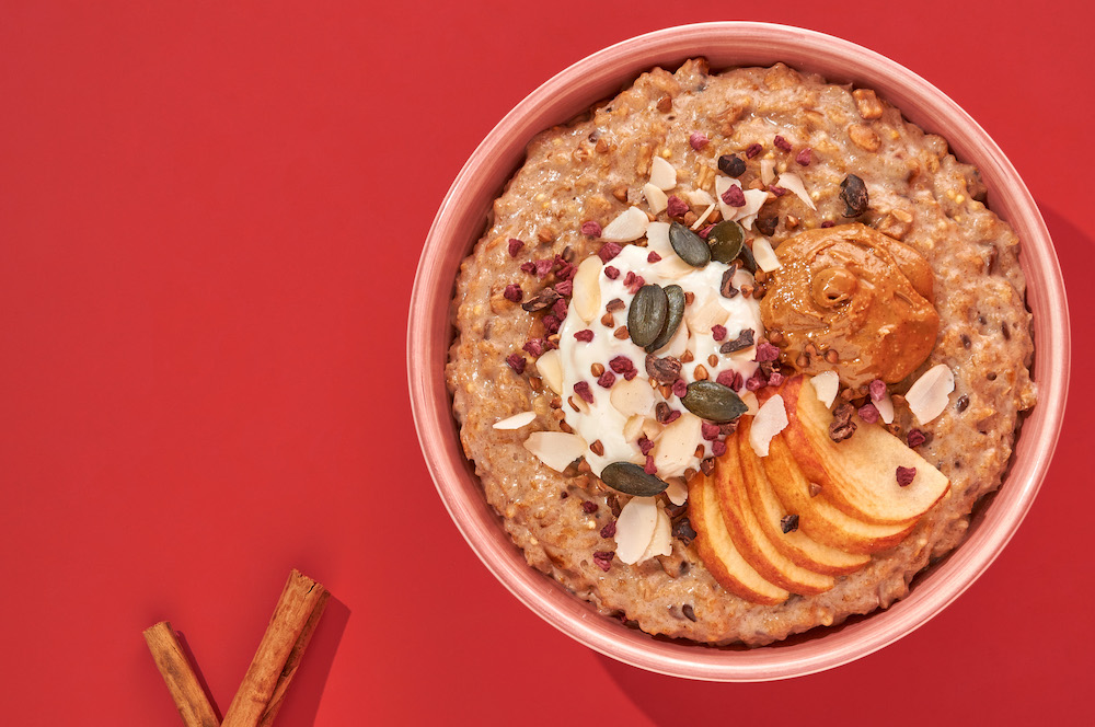 Porridge with apples, nut butter and almonds