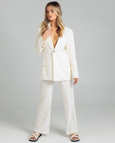 Off white cream suit and pant from Romy the brand