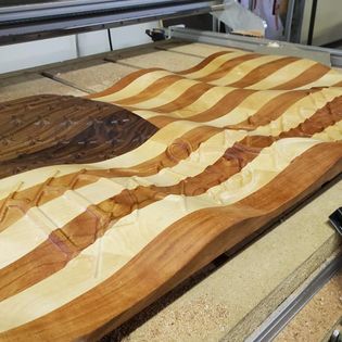 CNC wood carved wooden flag by Beamish Metal works