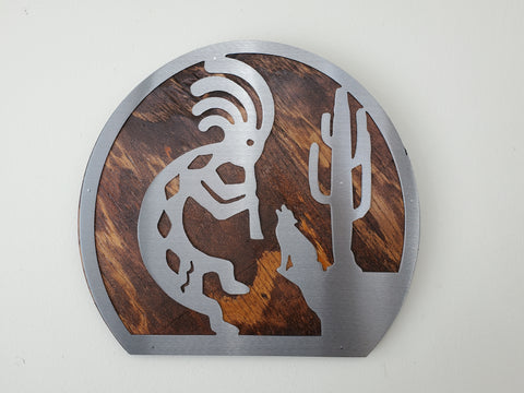 Southwestern style metal on wood wall hanging