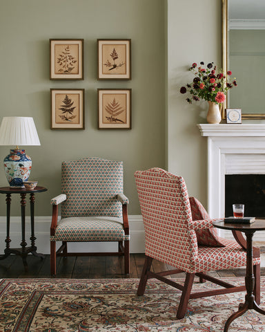 Colefax fabric Chairs: Woodberry, forest/red F4847-02 Woodberry, red/green F4847-01 Cushion: Hilaire, tomato F4846-01