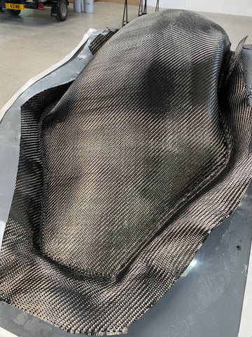 carbon fibre bucket seat ready for resin infusion