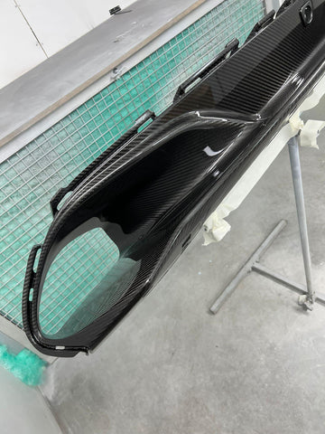 Repair and respray of a McLaren 720S carbon front bumper