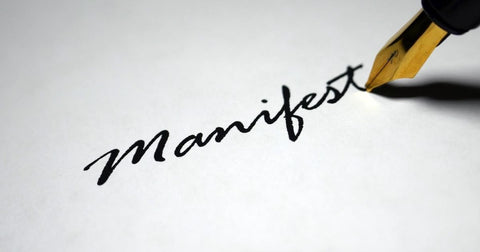 the word manifest written with a felt tip pen - splashpad self care