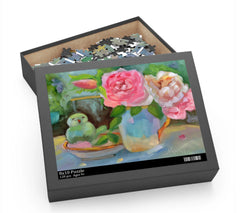 Puzzle of a garden scene with roses fille teacup and green ceramic bird by Marcy Brennan Art