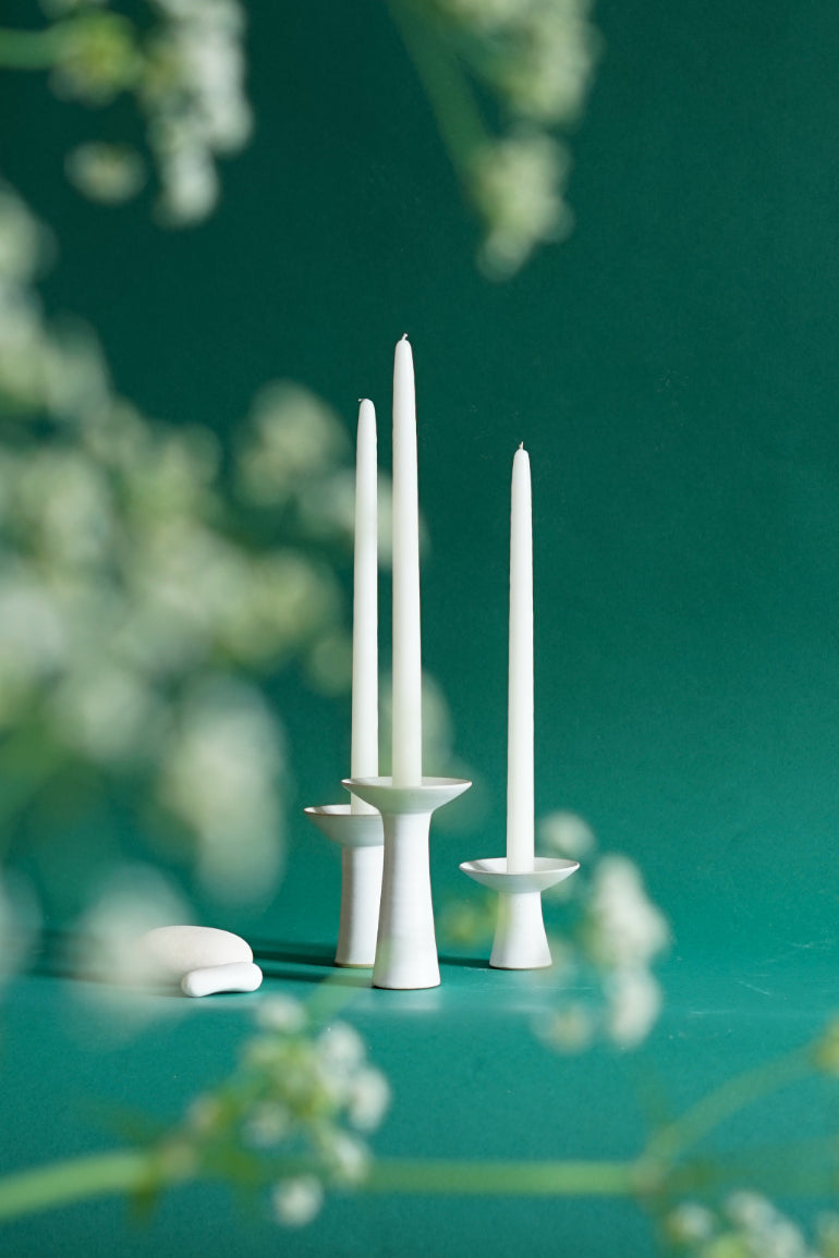 Three sizes of the Midsummer candlesticks by Cara Guthrie. Shot through cow parsley at Bard Scotland in Leith.