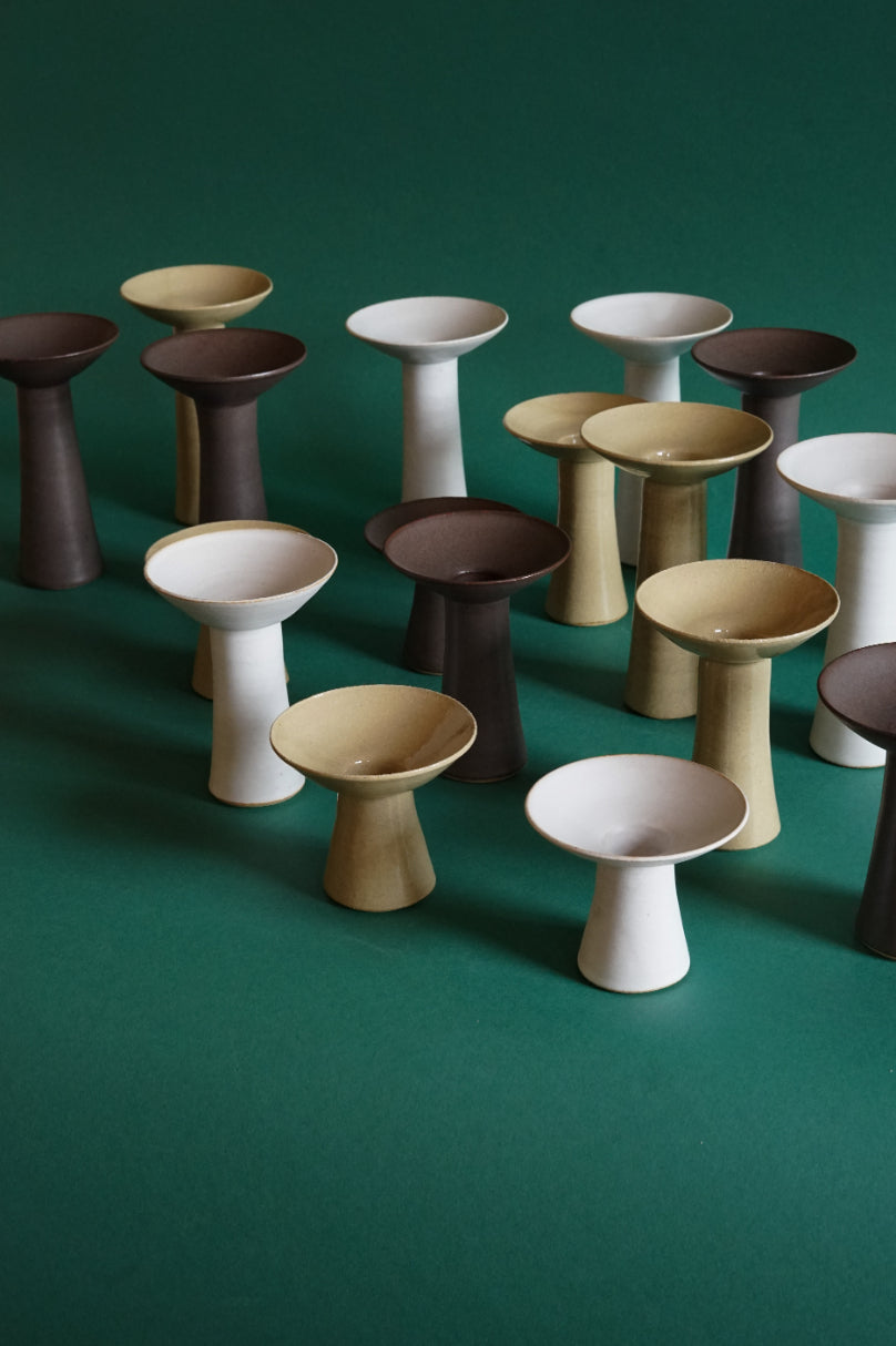 The Midsummer Candlestick collection by Cara Guthrie for Bard. In colours Chalk, Clay and Iron.