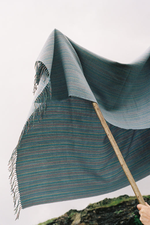 Flying a Drove Weavers merino throw at Arthur's seat.