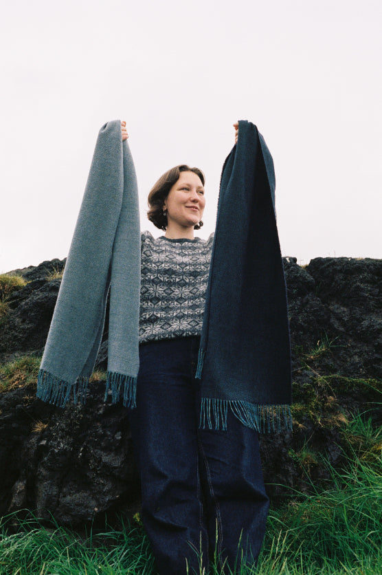 A pair of merino scarves by Drove Weavers, in blue and navy.