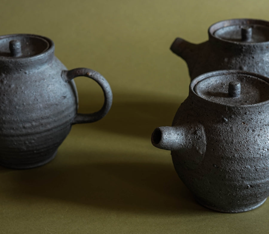 A group of three Ingot Objects teapots. A pleasingly round shape and highly textured.  