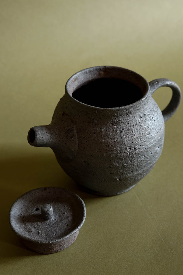 Black Rounded Teapot thrown by Jonathan Wade of Ingot Objects, using an iron-rich clay.