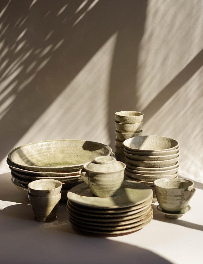 A range of ash glazed crockery and vessels from Ingot Objects available at Bard Scotland.