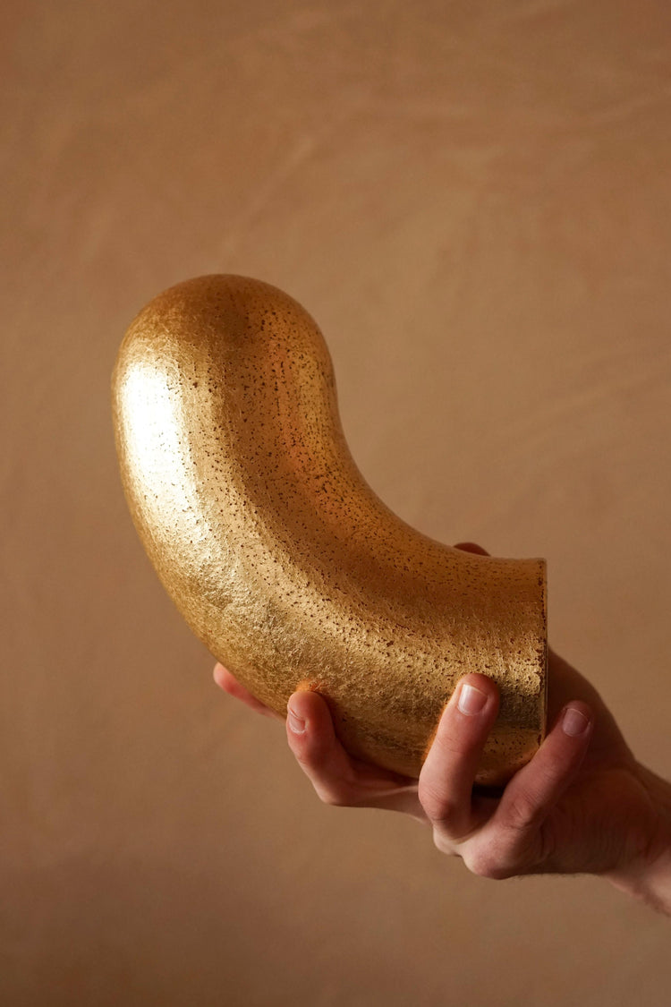 The Horn, a golden ceramic hook by sculptor James Rigler. Sold at Bard, a new shop and gallery space in Leith, Edinburgh.