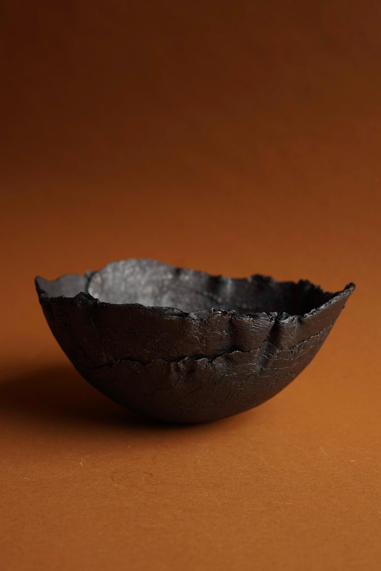 Daniel Freyne's Layered Iron Bowl is made from forged iron, beaten into bowl form.