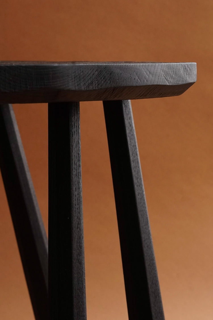  The edge of a Black House Stool. Made in Scottish ash, stained with Indian ink and finished with beeswax.