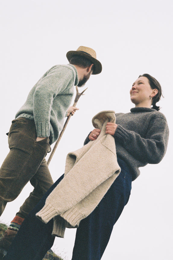 The lupetto neck woolen jumpers modeled on Arthur's Seat in Edinburgh.