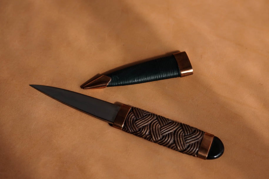 Walnut Sgian Dubh from Skye Knives. Forged and handmade by Jake Clelland.