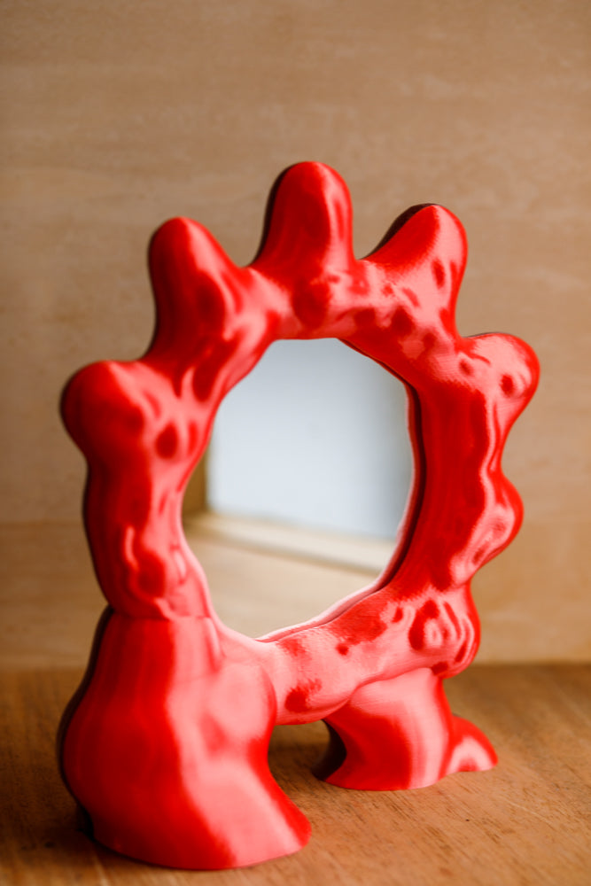 Bright satin red 3D printed mirror by Wobbly Digital Studio. Made in Glasgow.